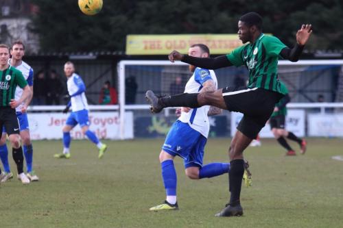 Burgess Hills Tolulope Jonah (green black) clears from Billy Bricknell