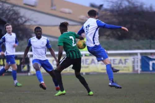 Enfields Junior Mubiayi (L) and Bilal Sayoud and Burgess Hills Boris Kipeya-Bonno