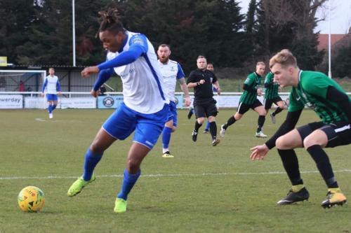 Enfields Karl Oliyide (L) and Burgess Hills James Richmond