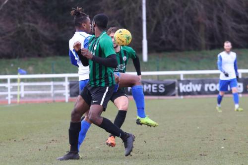 Enfields Karl Oliyide and Burgess Hills Tolulope Jonah (front) and Tom Cadman