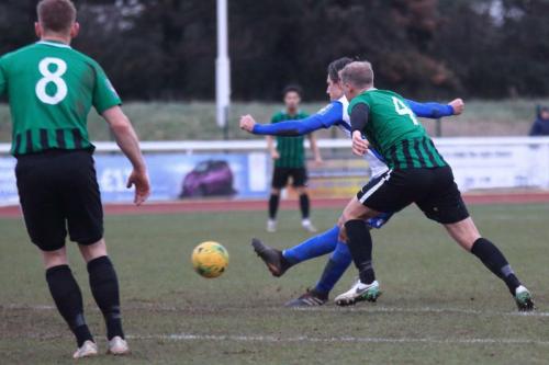 Enfields Sam Youngs gets is shot away despite the attentions of Steve Sargent (4)