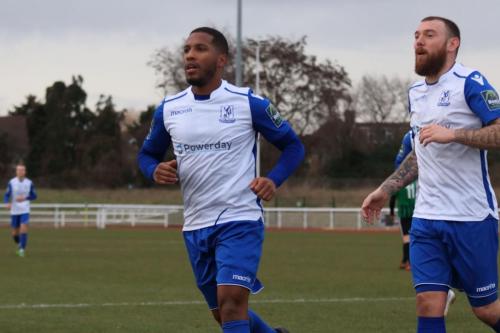 James Mulley (L) and Billy Bricknell join the celebrations for the opening goal