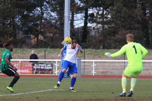 Rather than head for goal, Enfields Billy Bricknell opts to try to set up a teammate