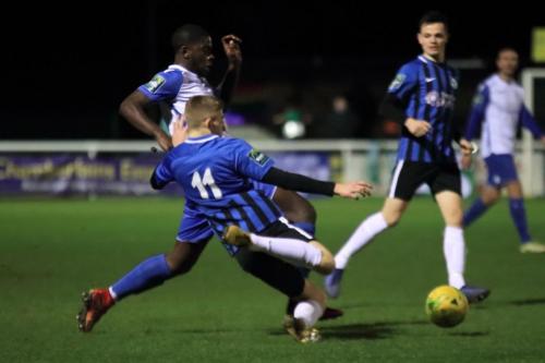 Burgess Hills Josh Short (11) challenges Junior Mubiayi