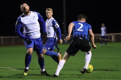 Burgess Hills Josh Tuck (R) clears from Billy Bricknell (L) and Ryan Blackman
