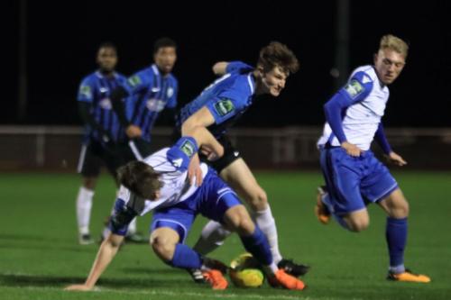 Burgess Hills Josh Tuck (blue) challenges Josh Davison