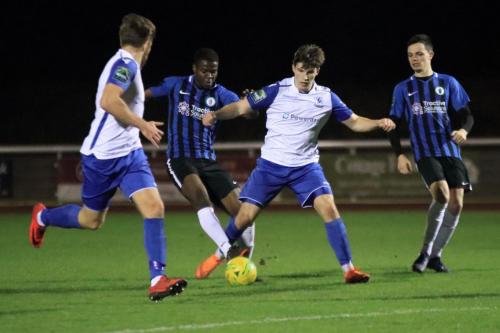 Burgess Hills Tolulope Jonah (blue, L) challenges Josh Davison watched by Remi Sutton (L) and Charlie Bennett