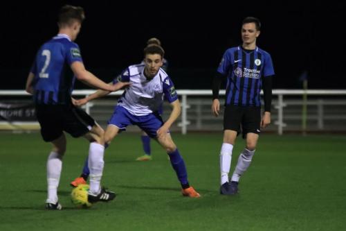 Enfields Bilal Sayoud and Burgess Hills Josh Tuck (L) and Charlie Bennett