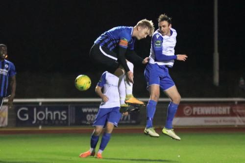 Enfields Matt Johnson (R) wins a header againsty James Richmond