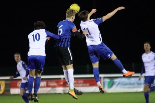 Enfields Sam Youngs (10) and Josh Davison and Burgess Hills James Richmond