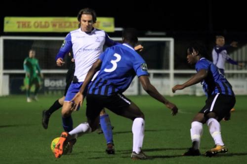 Enfields Sam Youngs runs at Tolulope Jonah (3) and Michael Twede