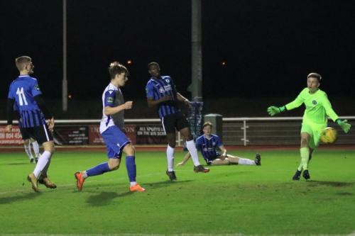 Josh Davison (white) scores his third and Enfields fourth