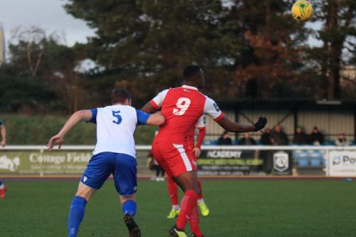 Enfields Marc Weatherstone (L) and Harlows Emile Acquah