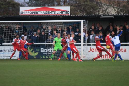 Enfields Matt Johson (R) sees his shot blocked