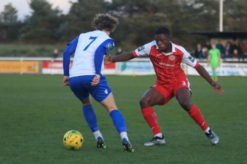 Enfields Mickey Parcell (L) and Harlows Yanick Kissi