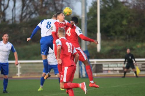 Enfields Ryan Blackman (8) challenges Tom Hitchcock