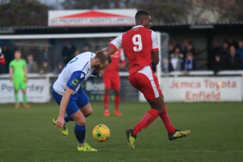 Enfields Sam Hatton (L) and Harlows Emile Acquah