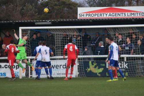 Harlow keeper Josh Bexon tips the ball over the bar