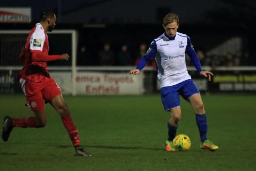 Harlows Paul Rodgers (L) and Enfields Aaron Greene