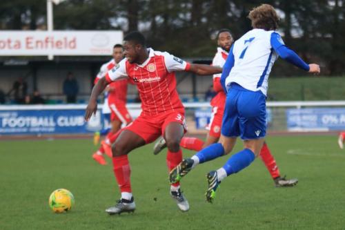 Harlows Yanick Kissi (L) and Enfields Mickey Parcell