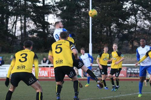 Billy Bricknell (9) heads the opening goal