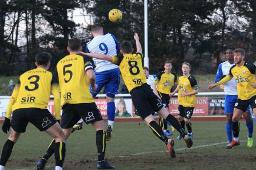 Billy Bricknell (9) heads the opening goalx