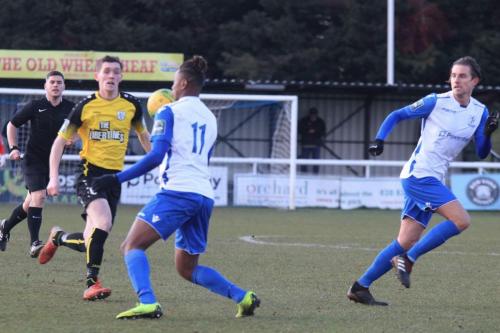 Enfields Karl Oliyide (11) and Sam Youngs and Margates Connor Dymond