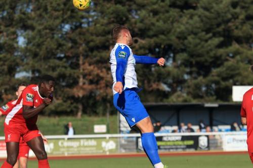 Dan Rumens flicks the ball across goal tpo set up the opening goal