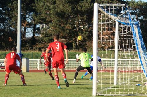 Enfields Aaron Greene lifts the ball over the defence to set up the fourth goal
