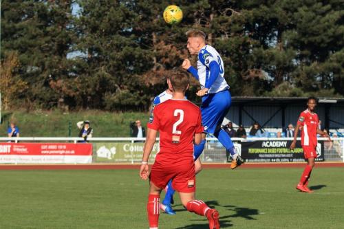Enfields Ryan Blackman wins a header