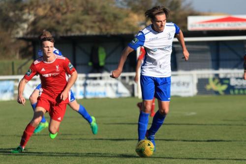 Enfields Sam Youngs (R) and Whitehawks Luke Emberson