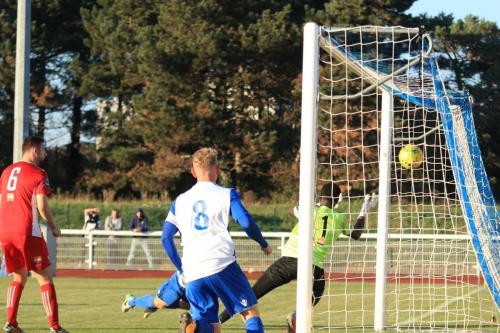 Liam Hope (behind no 8, Ryan Blackman) completes the scoringx