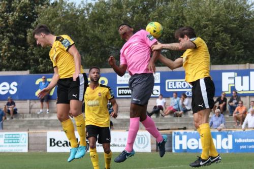 Enfields Rian McLean (pink) cant quite make contact with a cross