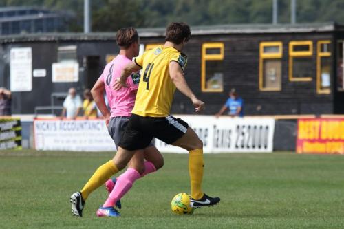 Enfields Sam Youngs (pink) and Folkestones Matt Newman