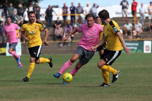 Enfields Sam Youngs and Folkestones Ronnie Dolan (L) and Matt Newman