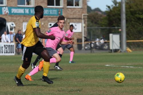 Folkestones Jerald Aboagye (L) and Enfields Bilal Sayoud