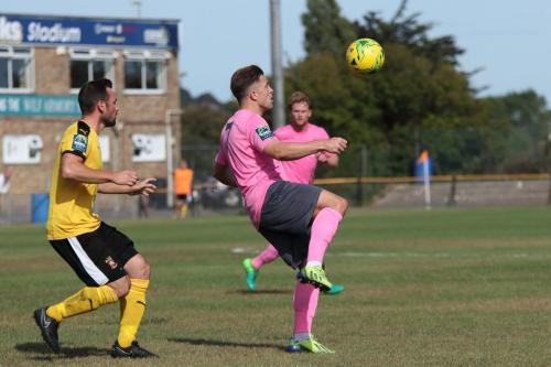 Folkestones Ronnie Dolan (L) and Enfields Lewis Taaffe