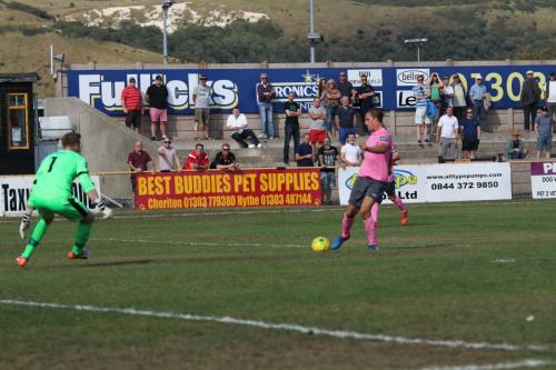 Sam Youngs lifts the ball over Folkestone keeper Tim Roberts  His shot hit the bar but was turned in by Brandon Adams for the winning goal