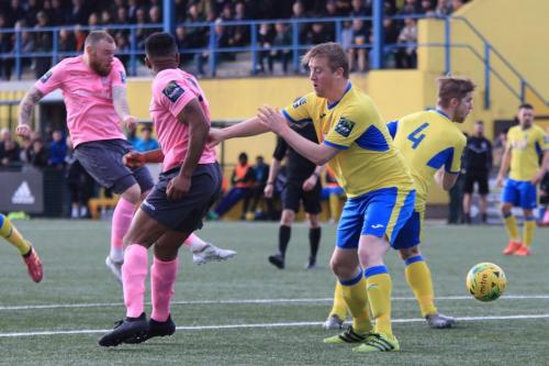 Billy Bricknell sees his shot blocked by Scott Mitchell (4)