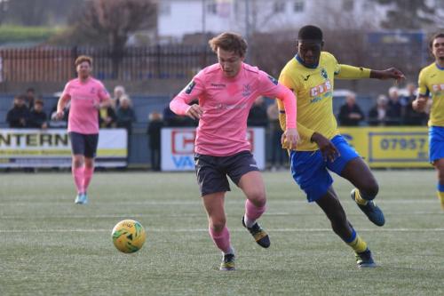 Enfields Mickery Parcell (L) and Joel Nouble, scorer of Haringeys first two goals