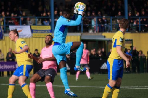Haringey keeper Valery Pajetat collects a cross