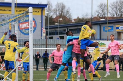 Haringey keeper Valery Pajetat punches clear