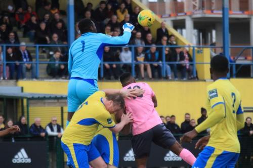 Haringey keeper Valery Pajetat punches clearx