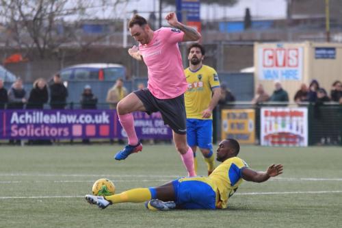 Haringeys Jorge Djassi-Sambu tackles Matt Johnson