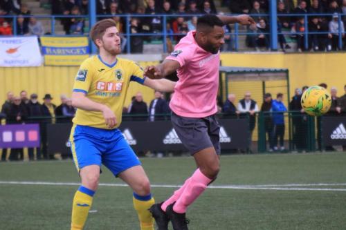 Haringeys Scott Mitchell (L) and Enfields Kezie Ibe