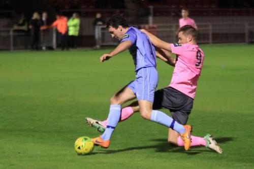 Enfields Liam Hope (R) challenges Roddy Collins
