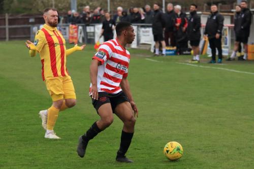 Enfields Billy Bricknell (L) and Kingstonians Jonathan Mulebax