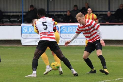 Enfields Billy Bricknell i s closely marked by Ismail Yakubu (5) and James Richmond