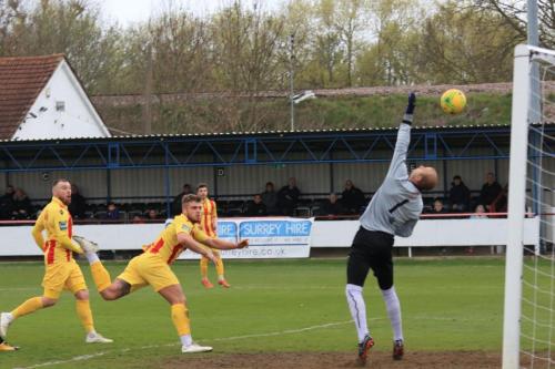 Enfields Dan Rumens (centre) heads past Rob Tolfrey to make the score 2-1 and raise hopes of a comeback