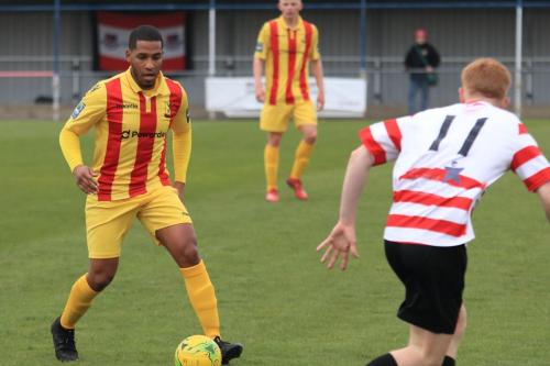 Enfields James Mulley (L) and Kingstonians Alfie Egan